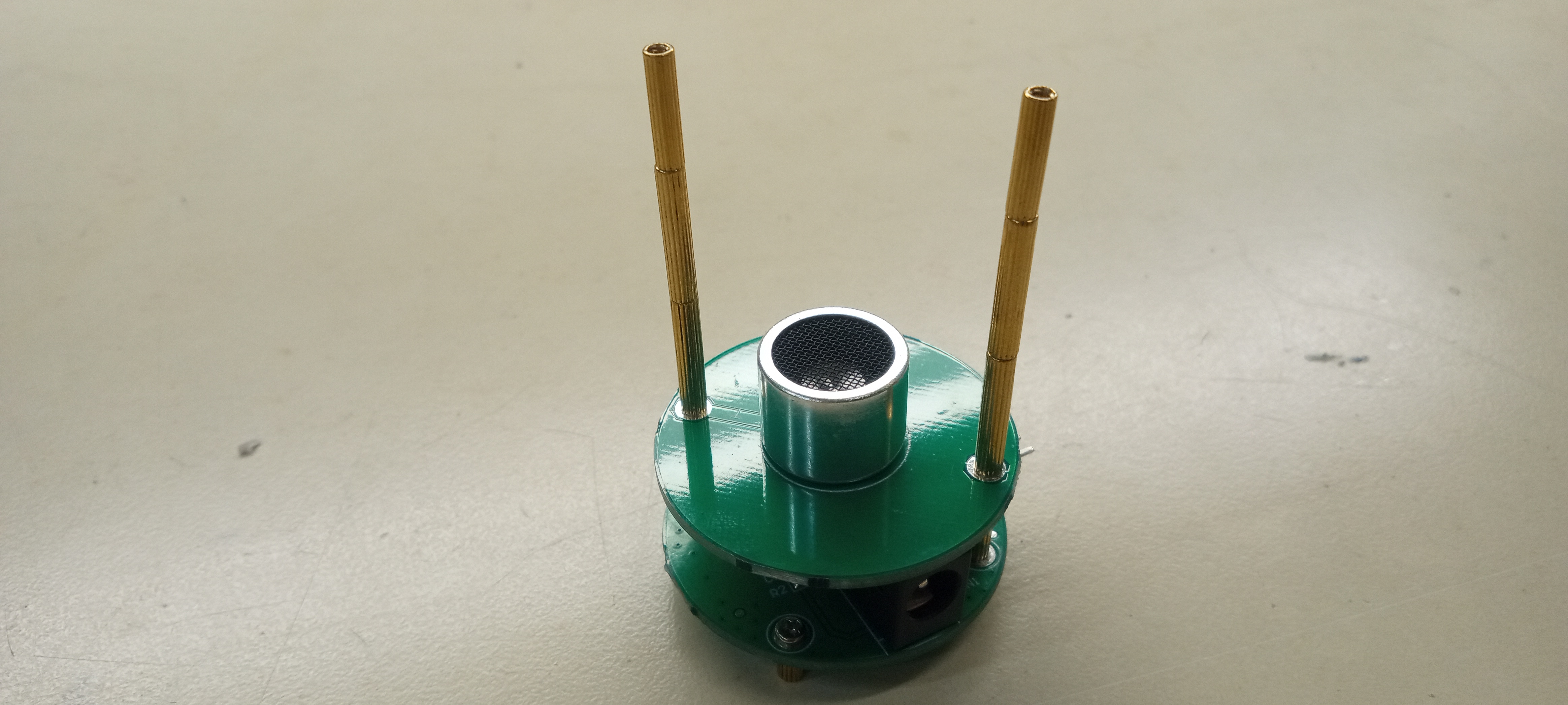 Partially assembled ultrasonic suspension device standing on spacers